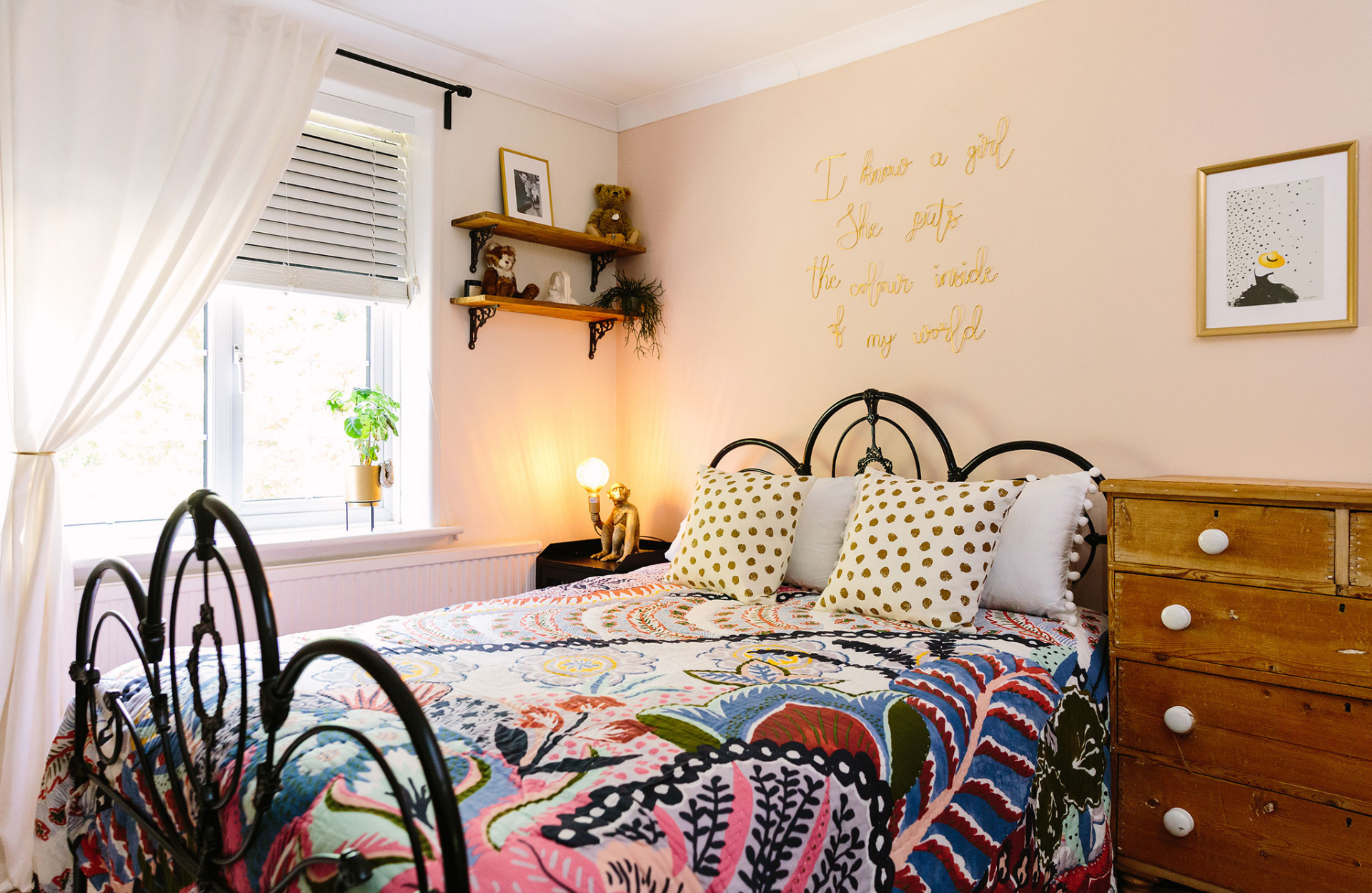Child's bedroom with patterned bedding 